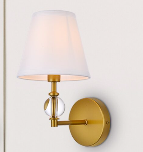 Small brushed gold sconce with drum shade
