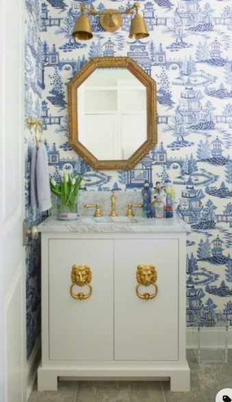 bathroom with gold lion hardware