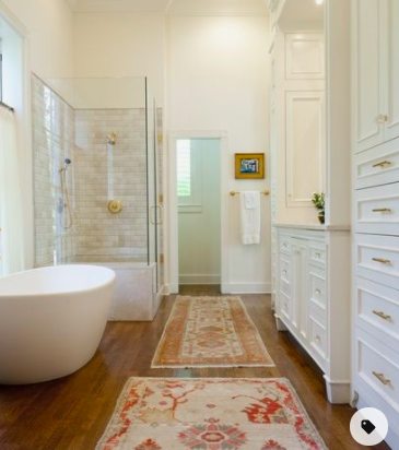 Master bathroom with oriental rugs