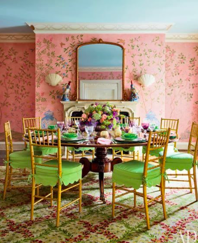 pink wall green chairs dining room