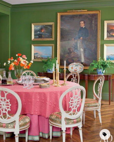 Hunter green walls pink dining room table