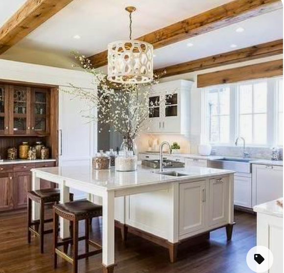 white and wood kitchen with wood beams