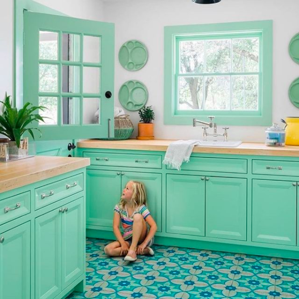 mint green and blue laundry room