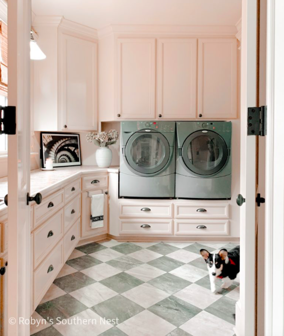pink laundry room with checkered floor