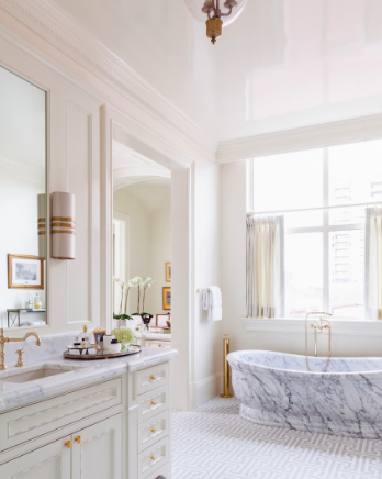 marble bath tub in front of window