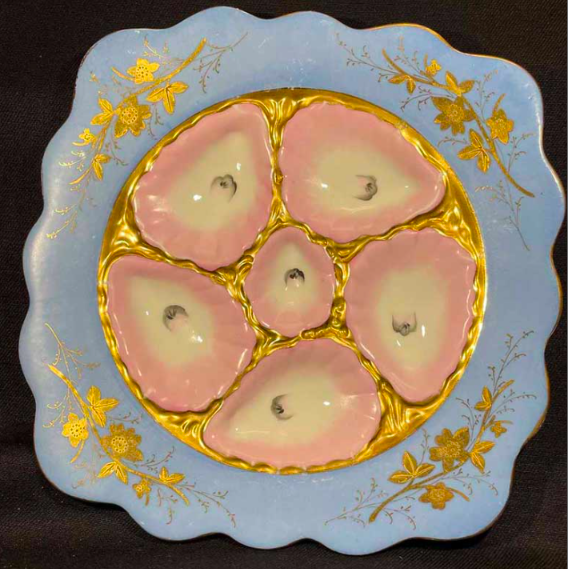 blue and pink antique oyster plate